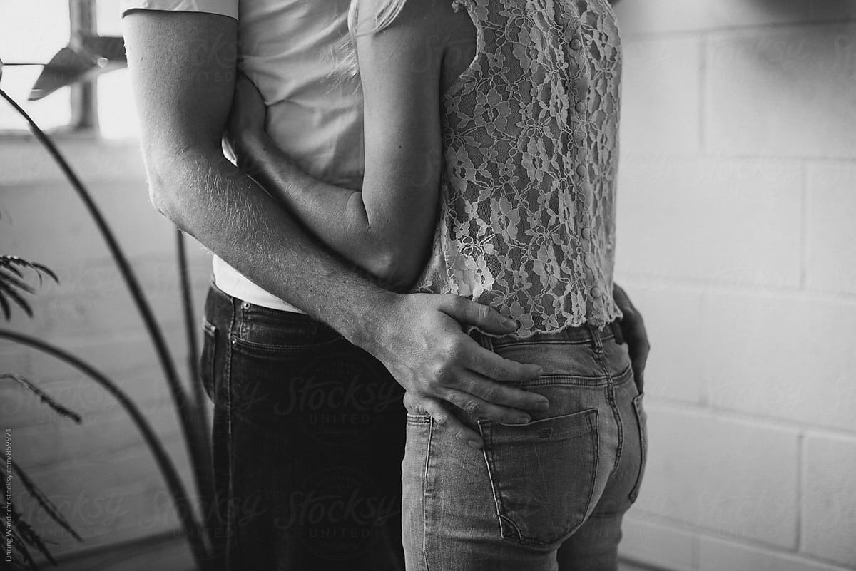 Stylish Couple Hugging At Home By Stocksy Contributor Jess Craven