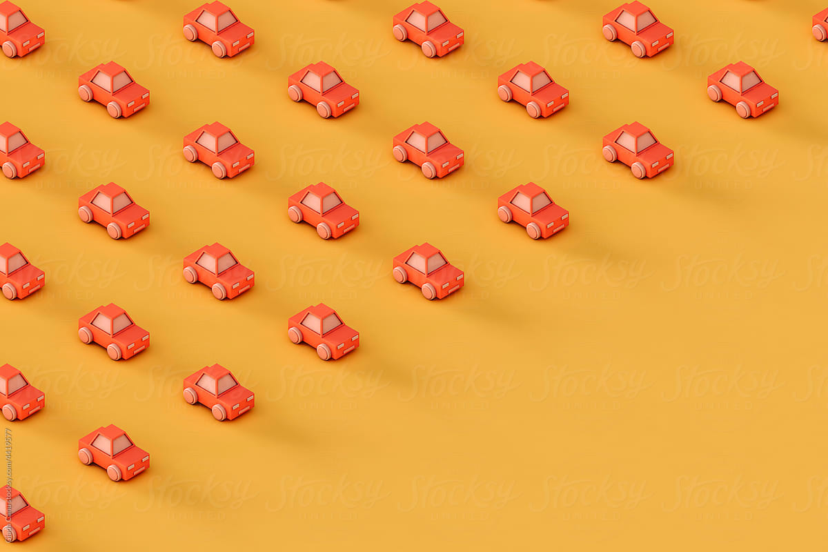 Pink toy car on a yellow background