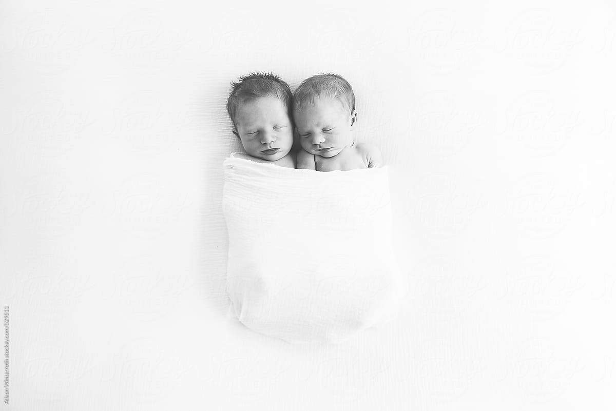 Boy and Girl Twins Swaddled Together