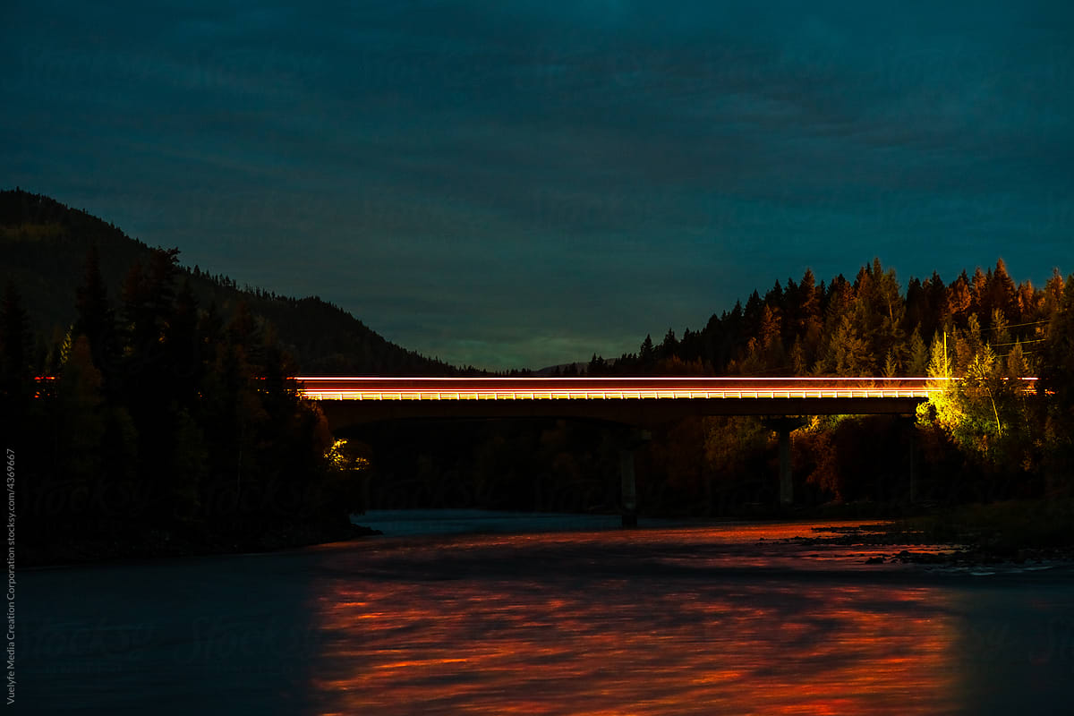 long exposure of truck go on the Clearwater River Bridge at night
