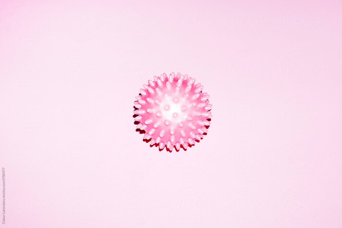 Neon pink sport spike ball with hard direct flashlight