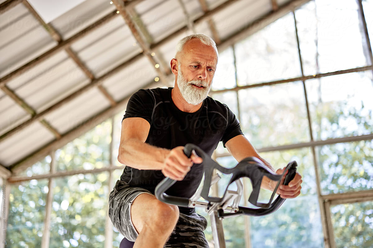 Man exercising on a stationary bicycle