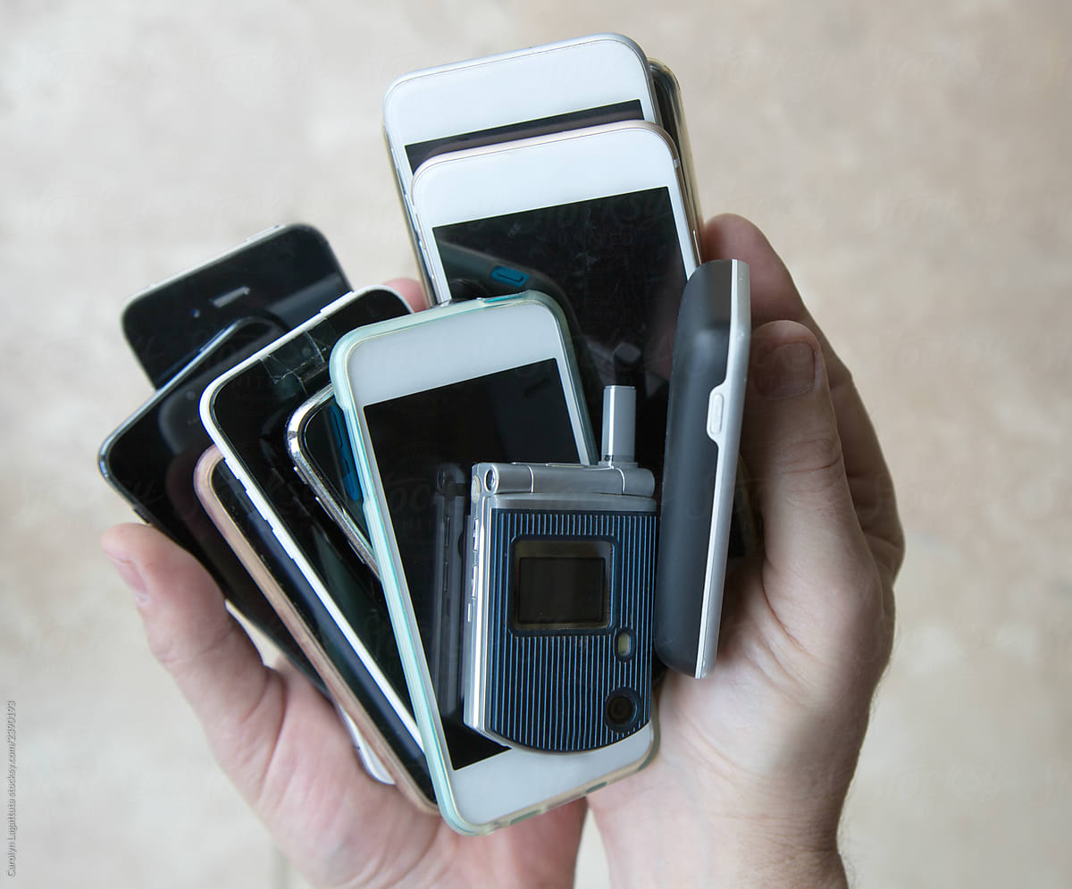 Collection of old, used and broken cell phones