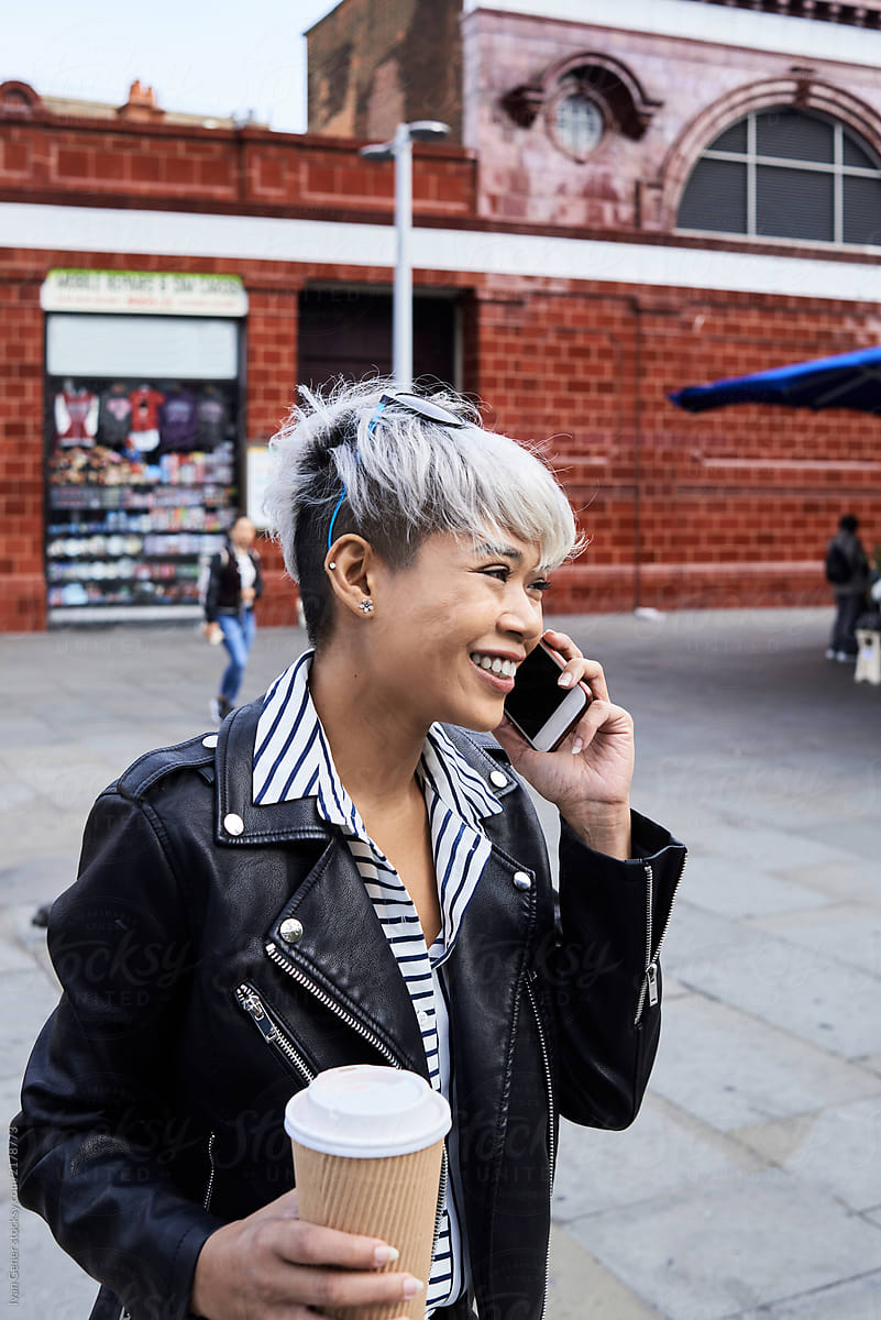 Silver hair lady chatting over the phone