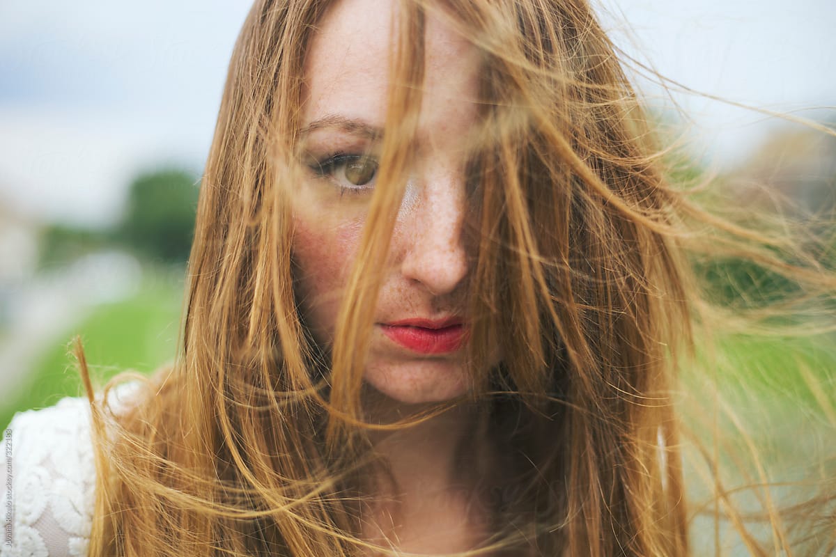 Portrait Of A Beautiful Young Woman With Hair Blown By Wind By Stocksy Contributor Jovana 5726