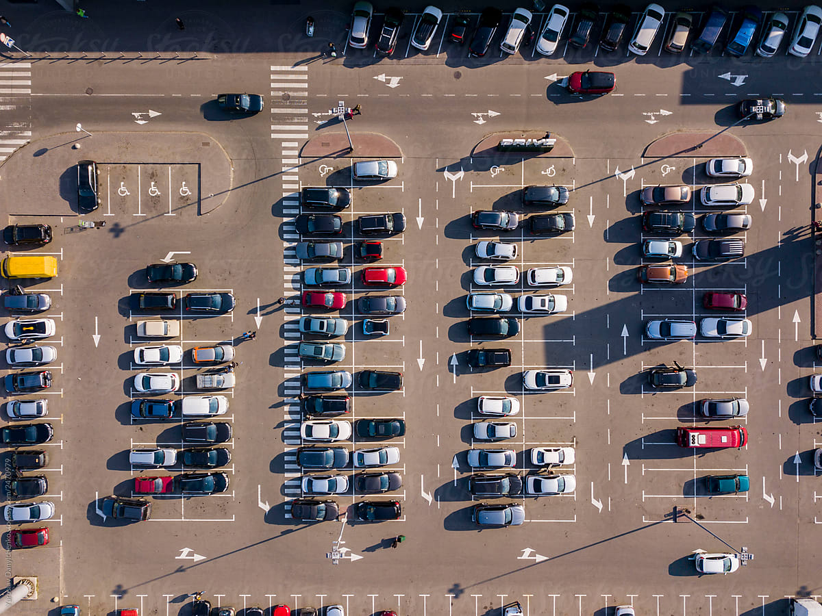 Aerial view on parking with cars on asphalt.