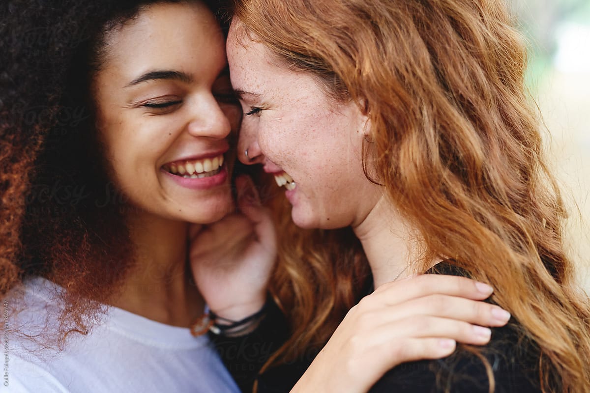 Close Up Of Two Young Girlfriends Laughing By Stocksy Contributor Guille Faingold Stocksy 