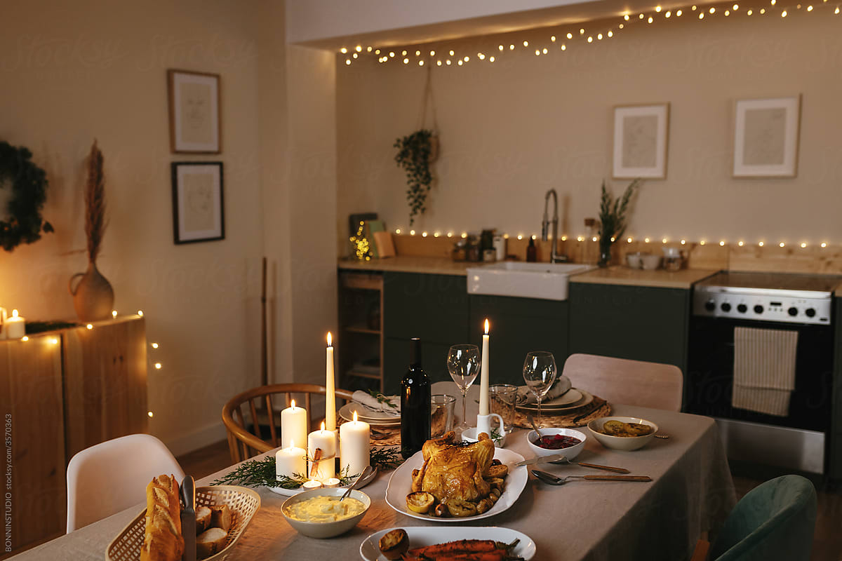 Room with festive table served for Christmas dinner