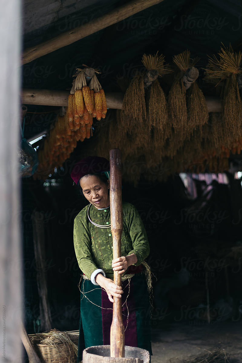 Vietnamese local woman working with hemp in her workshop