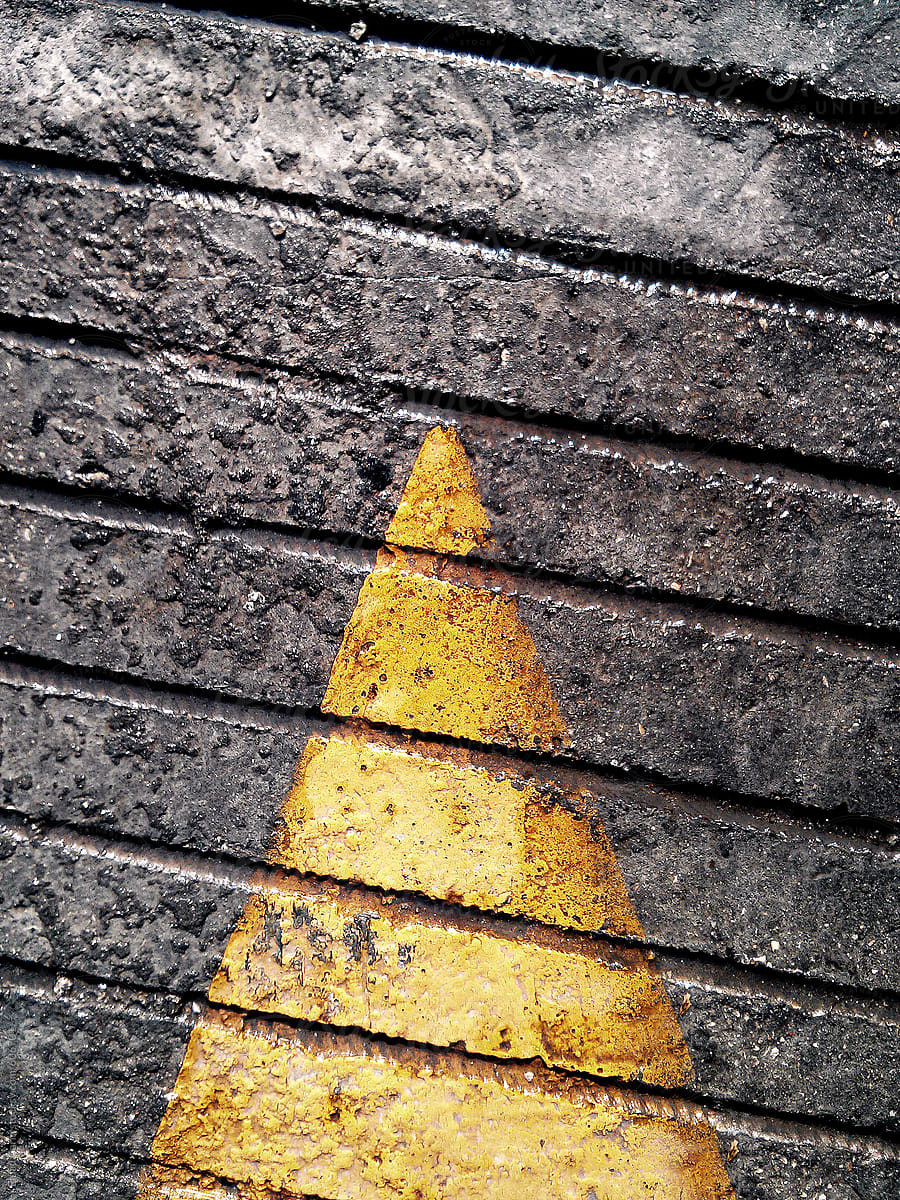 Abstract Concrete Background with Yellow Triangle