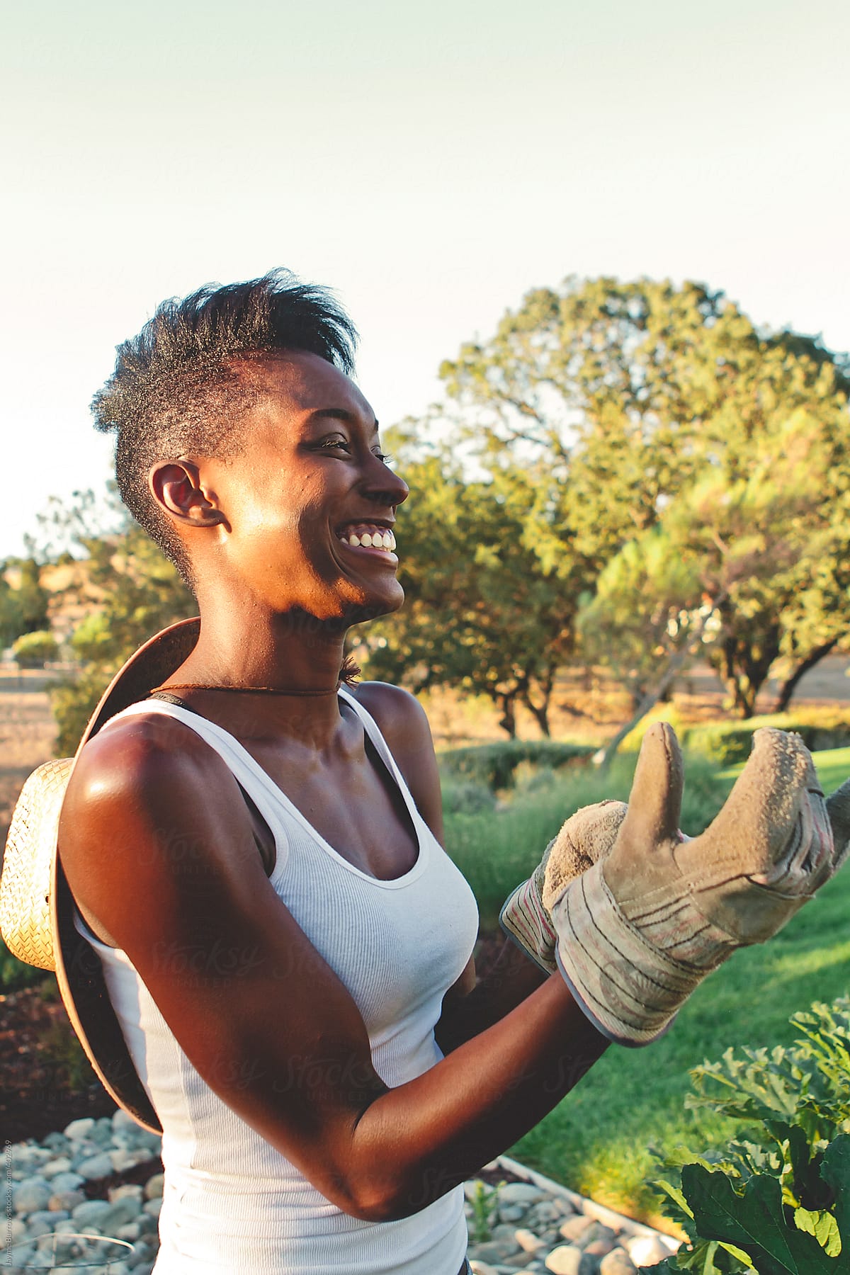 Healthy Woman Prepares To Garden By Stocksy Contributor Jayme