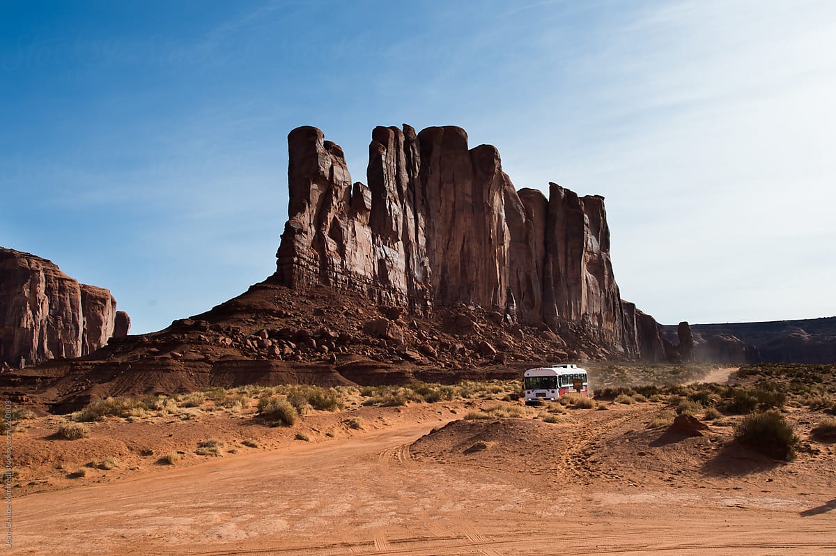 Touristic Bus travel through the Monument Valley