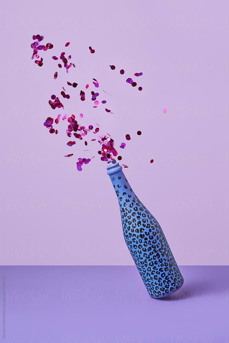 Painted champagne bottle with colorful confetti
