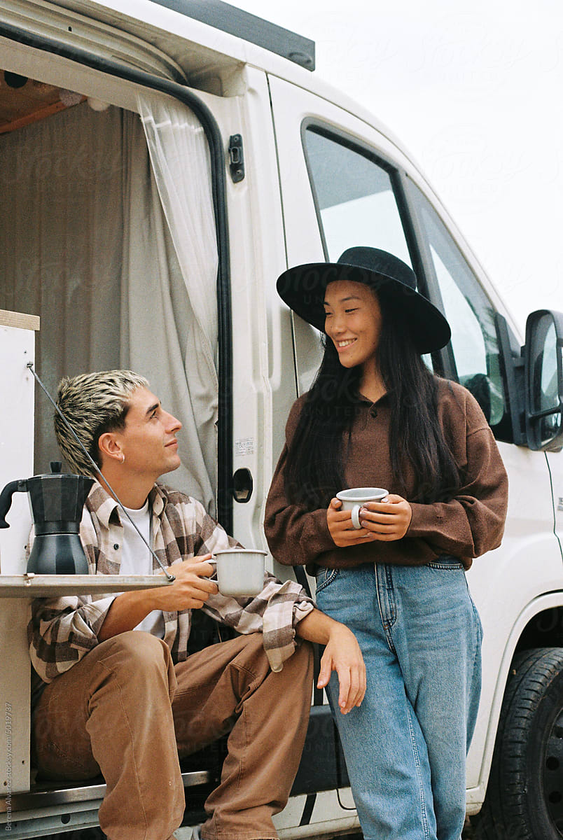 Happy Couple In Camper Van