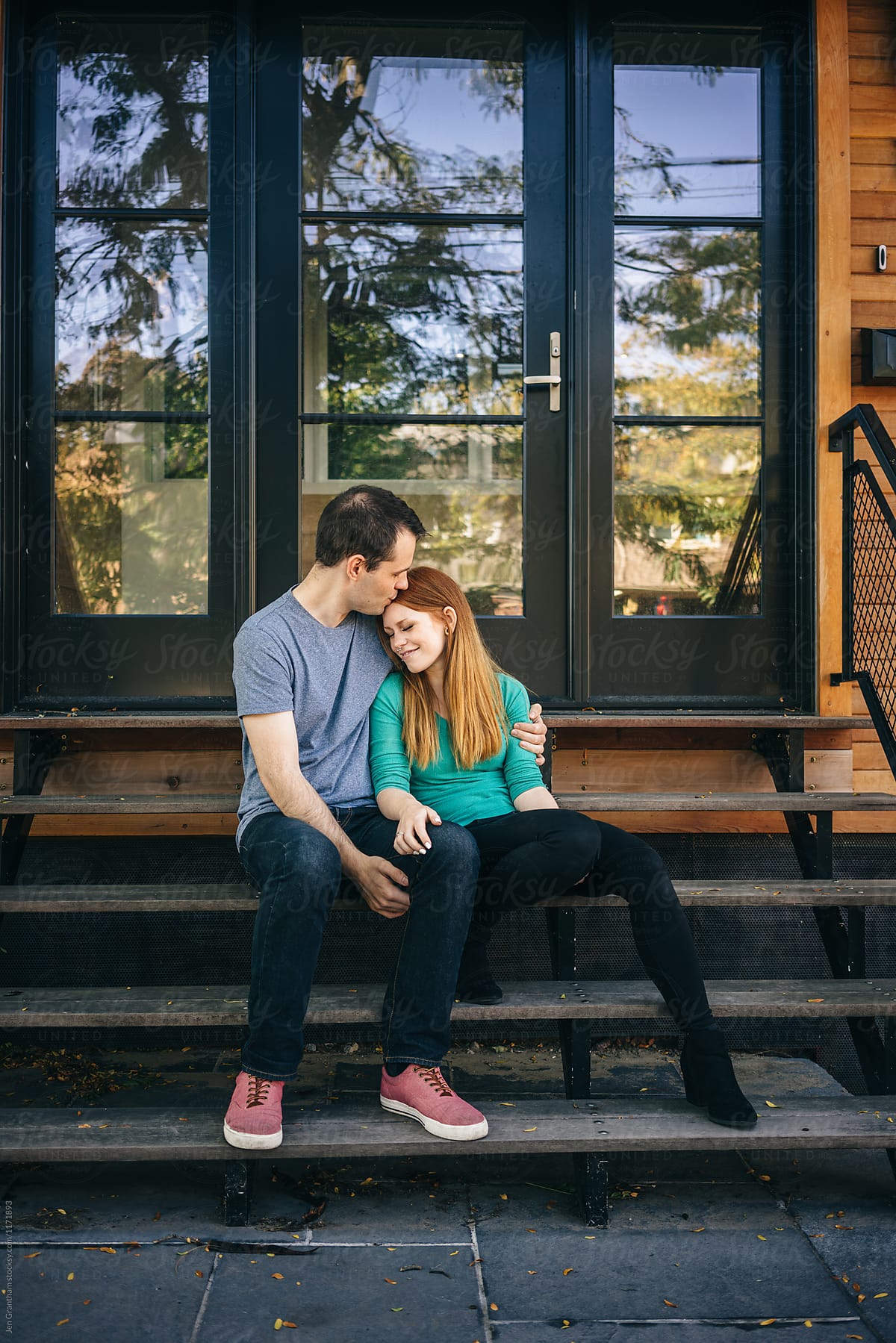Young Couple Sitting On Steps Of New Home By Stocksy Contributor Jen Grantham Stocksy