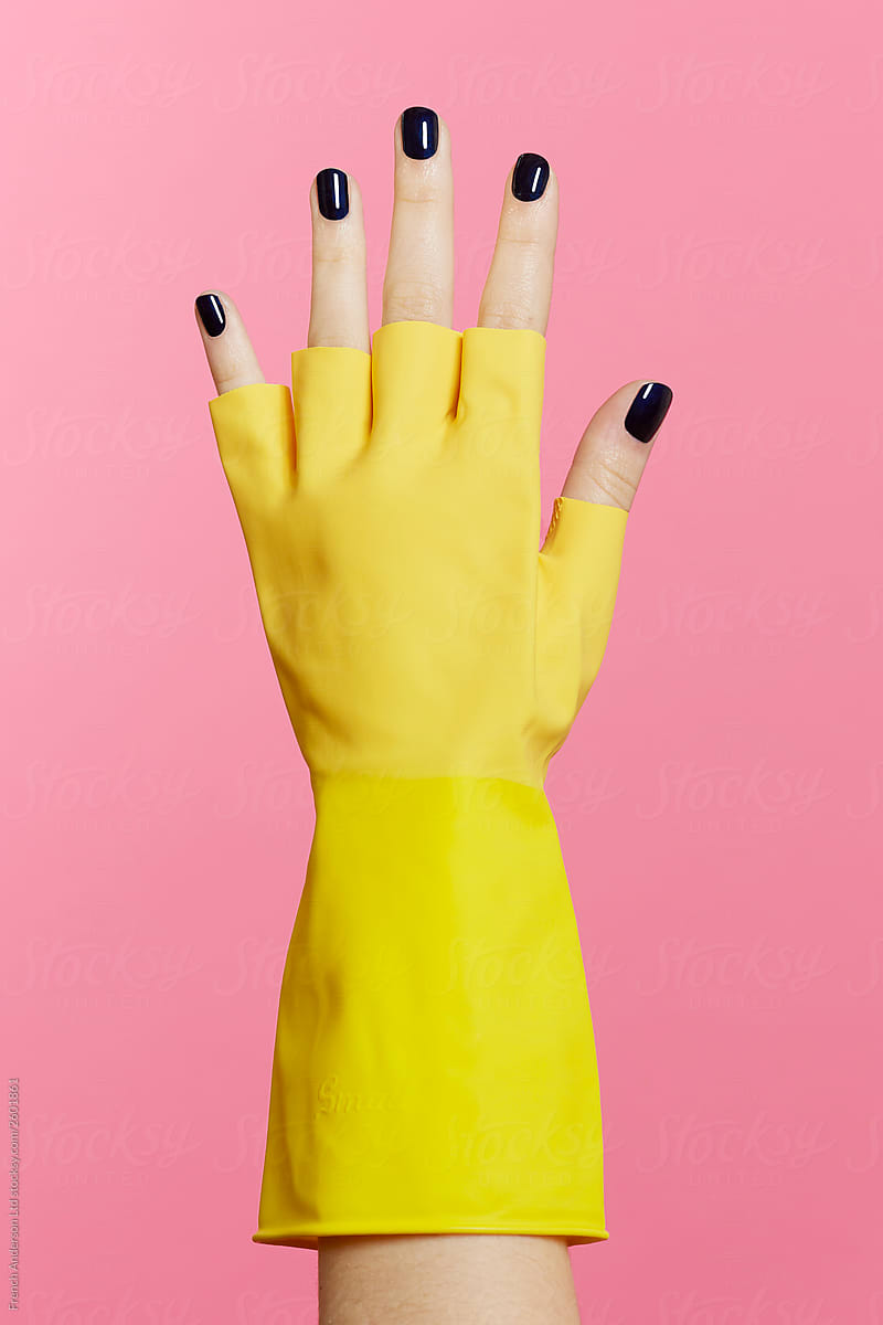 Painted nails and rubber glove