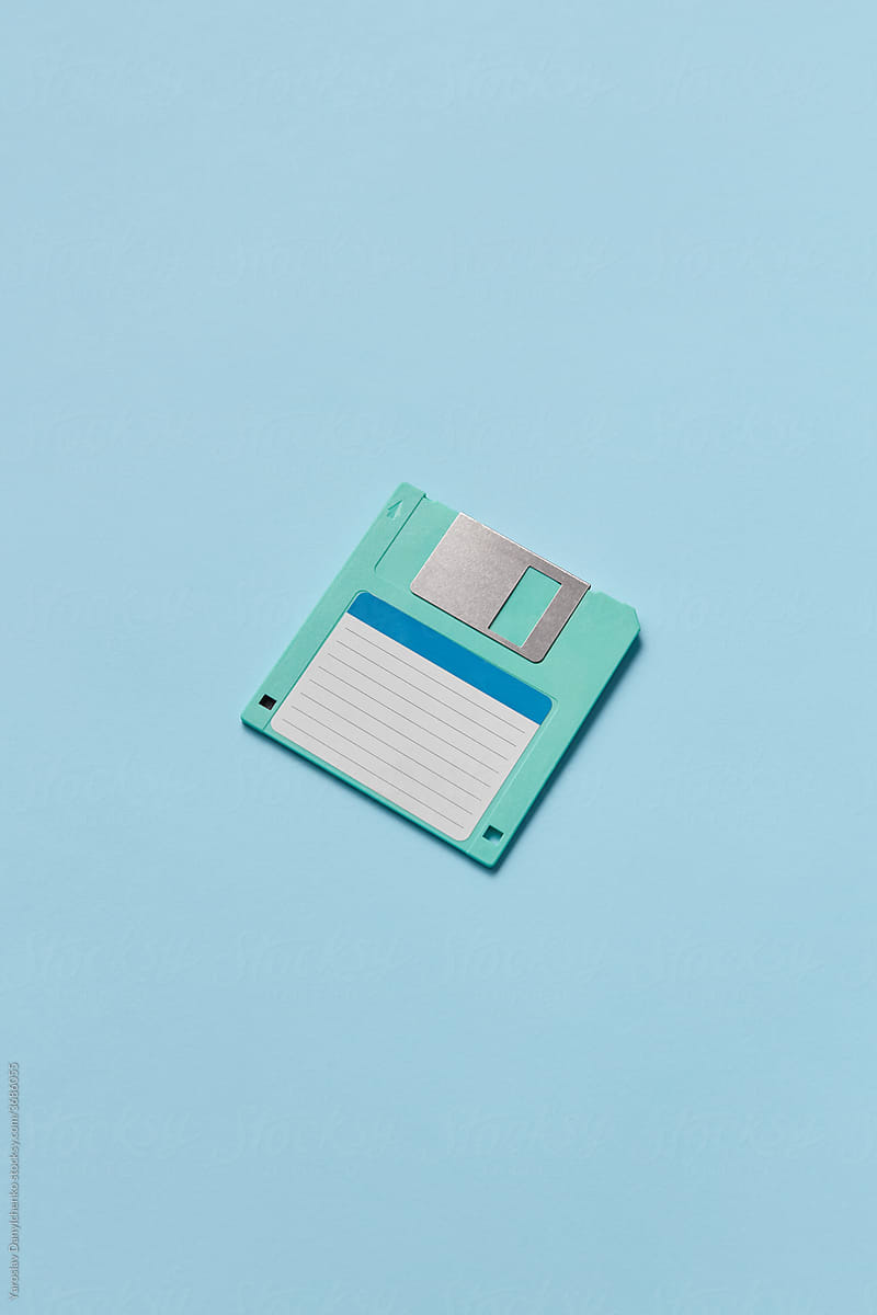One turquoise floppy disc