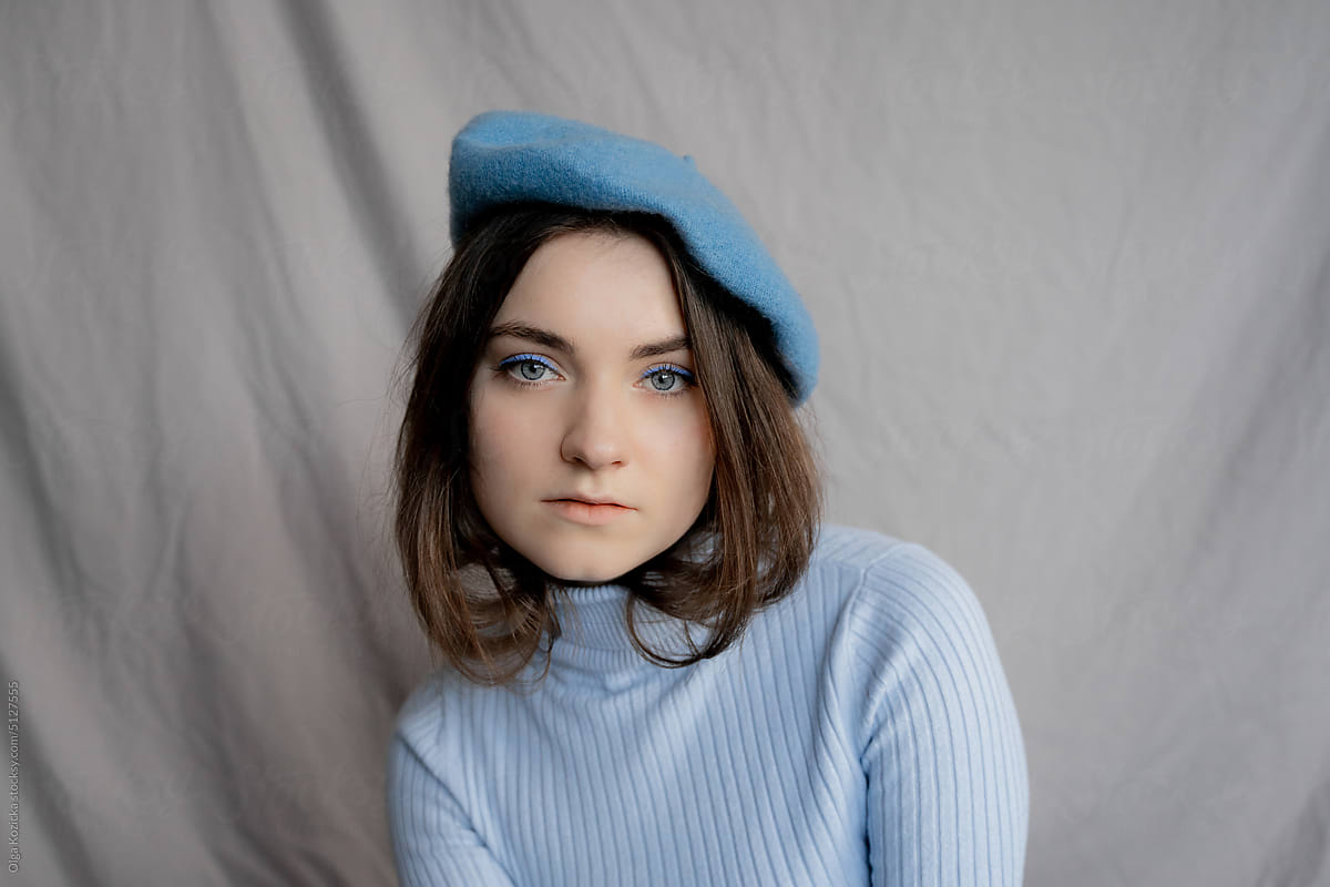 Woman In Blue Beret and Blue Turtleneck