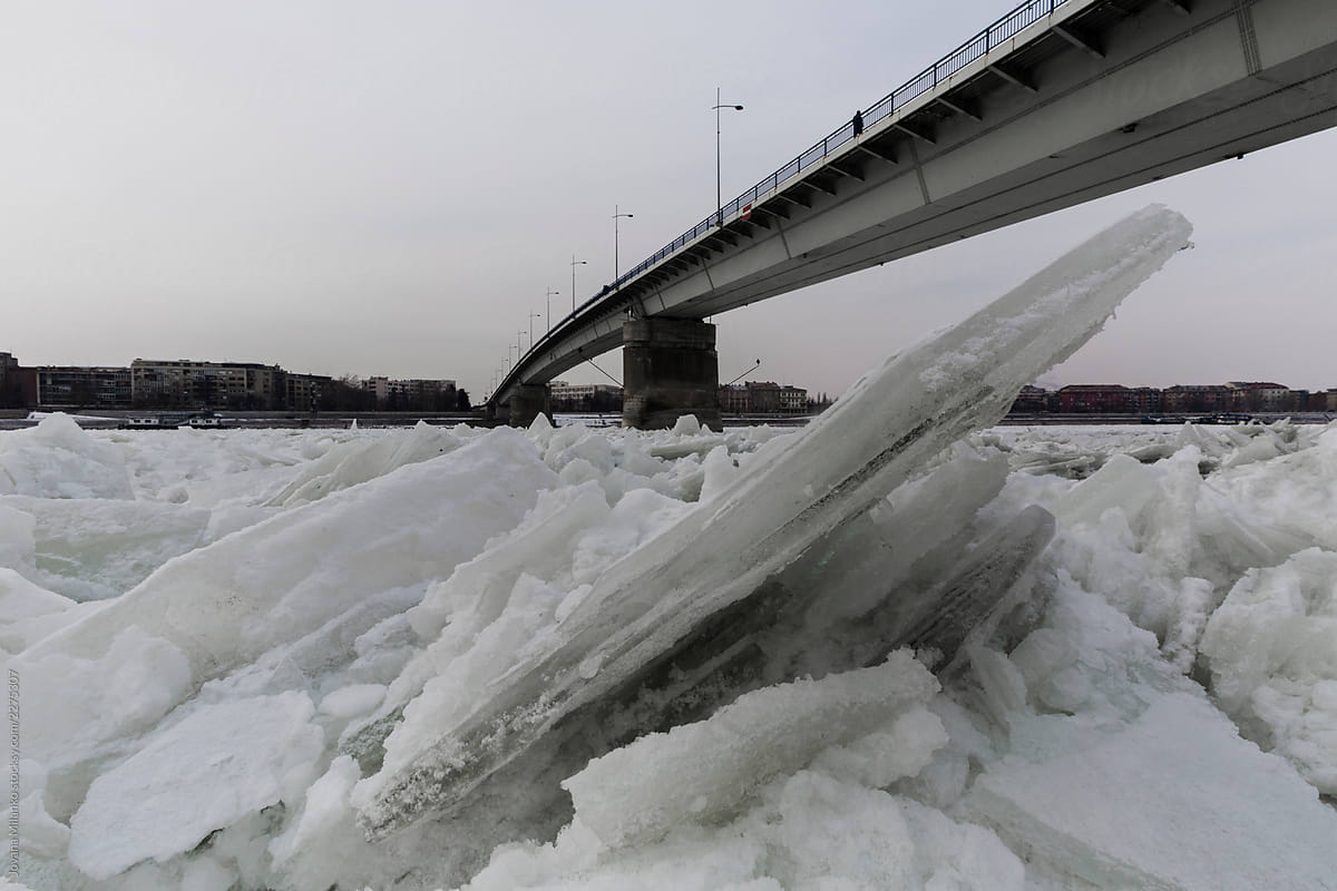 Frozen thick ice under the bridge