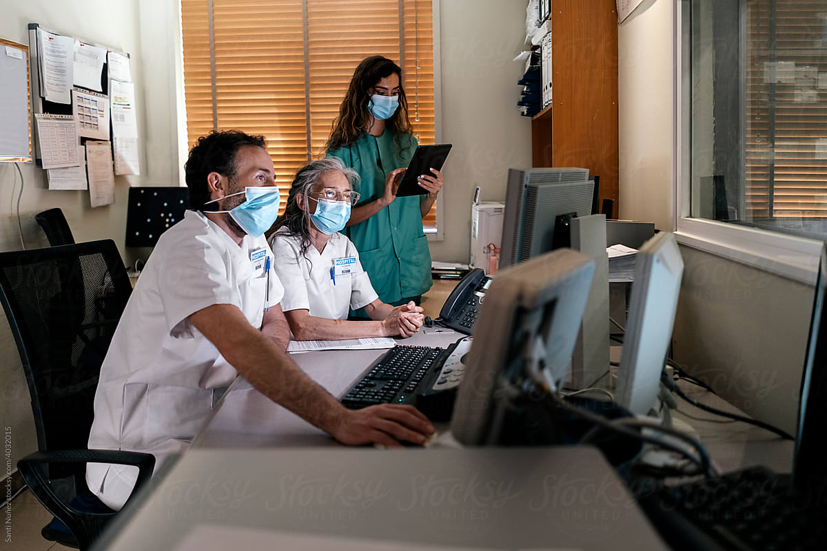 Medic Workers Using Computer