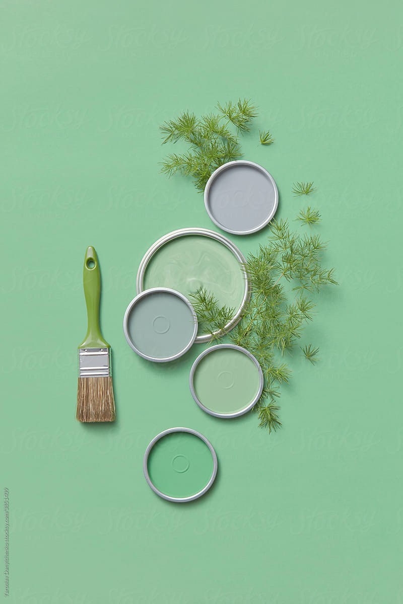 Green lids of paints and leaves