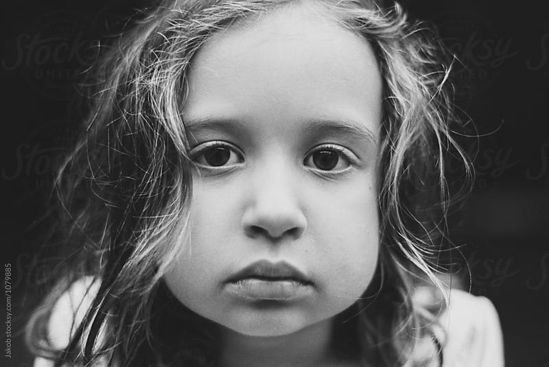 Close up portrait of a beautiful young girl in black and white