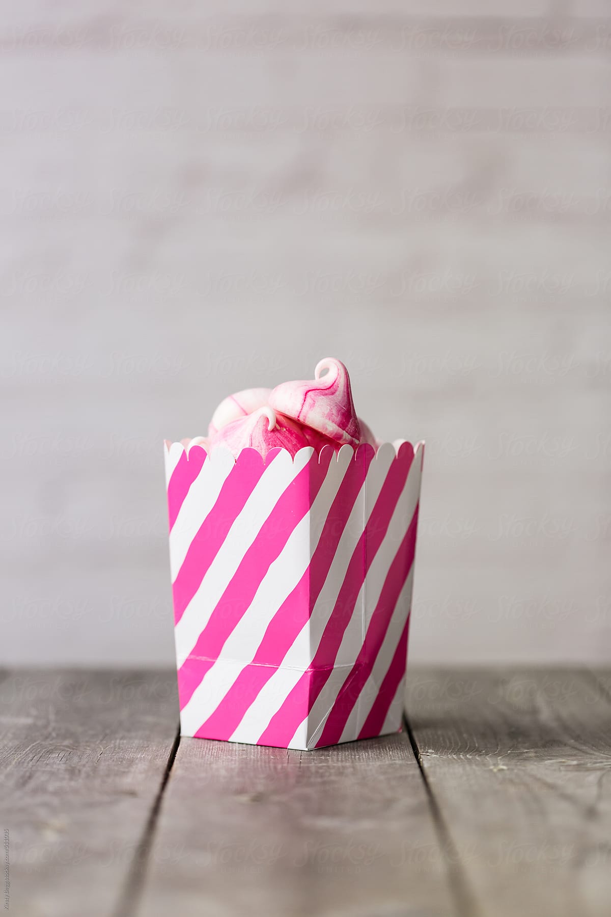 Prink striped Meringue Kisses in pink and white treat box