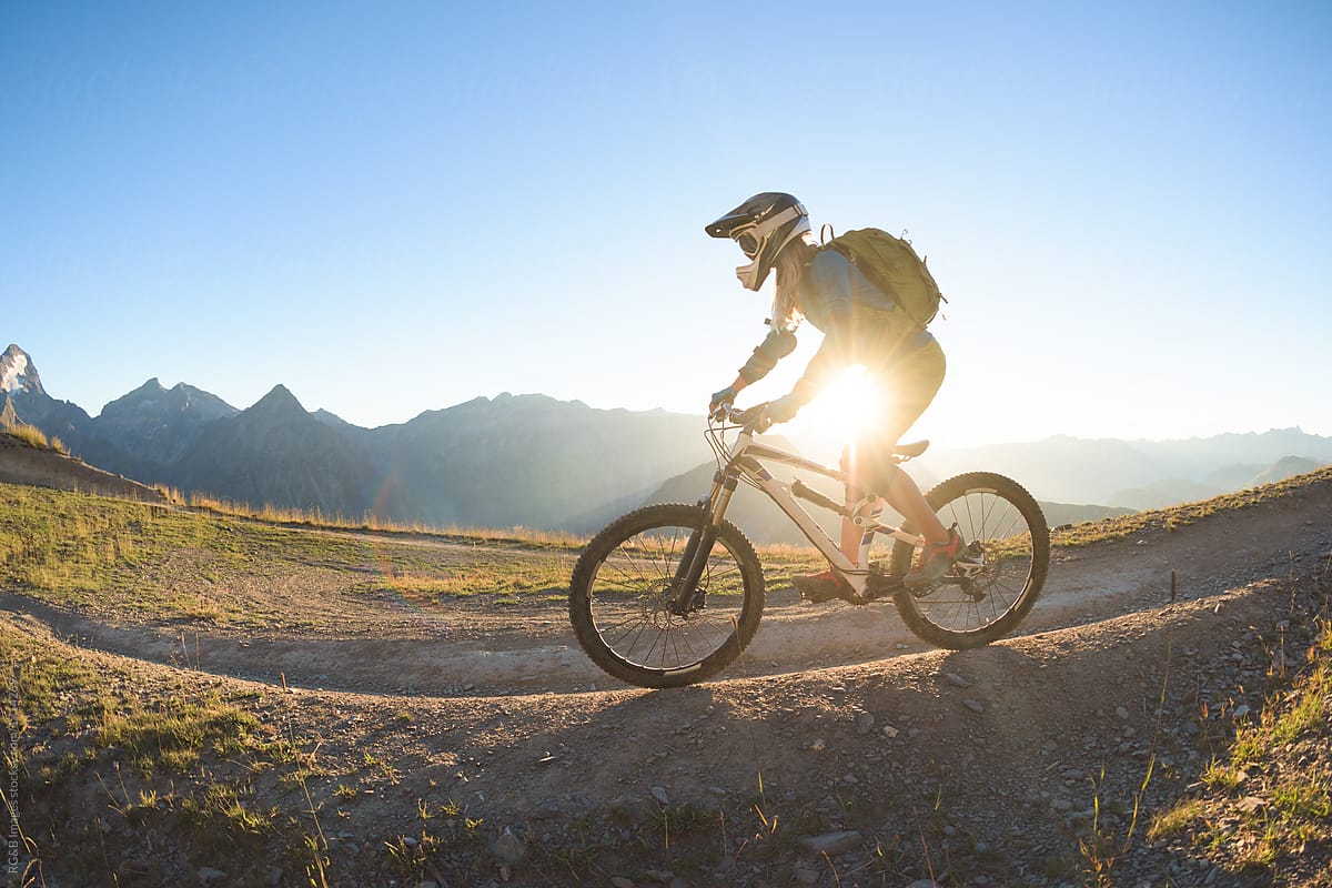 Woman riding mountain bike on staggering backcountry route