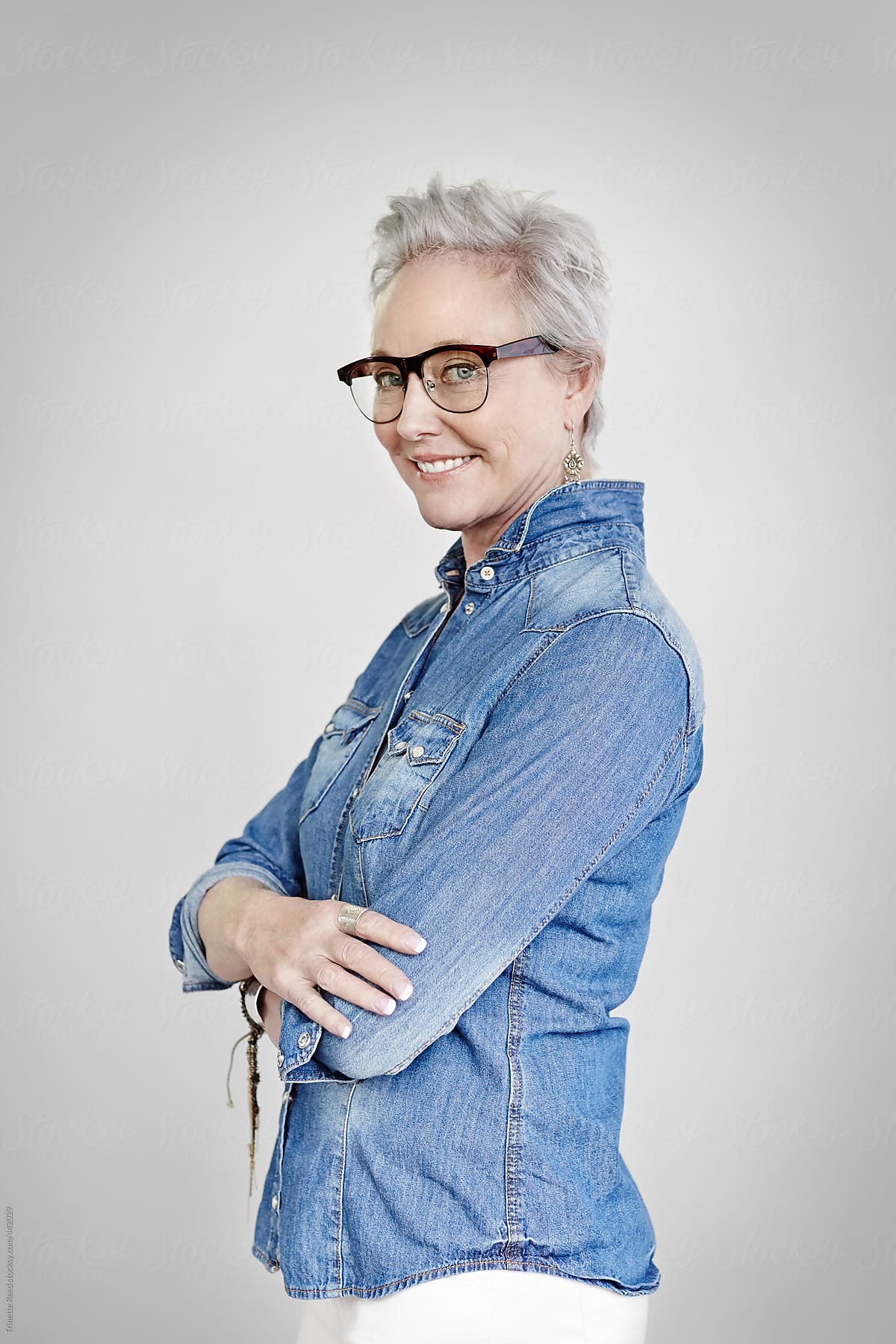 Portrait of stylish mature woman with grey hair