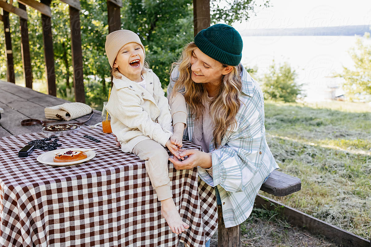A woman and her daughter on a picnic