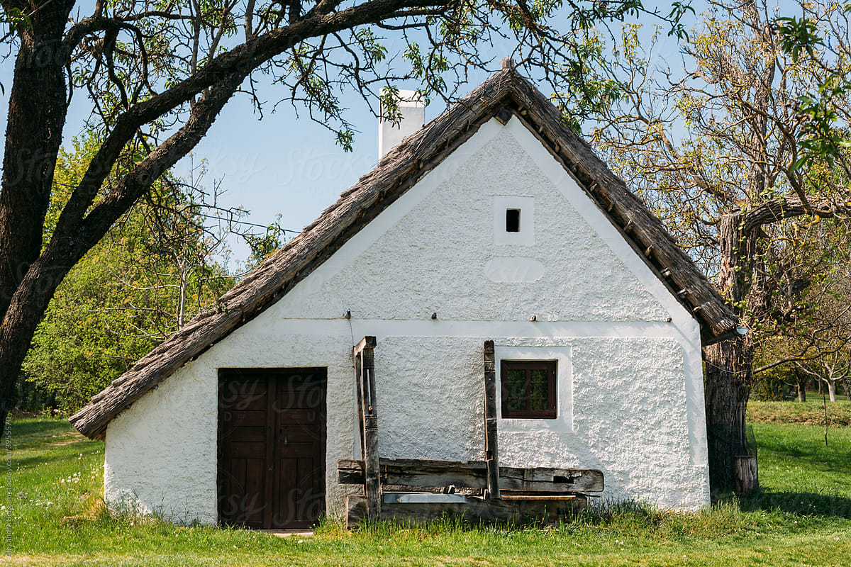 Old style white countryside cottage house