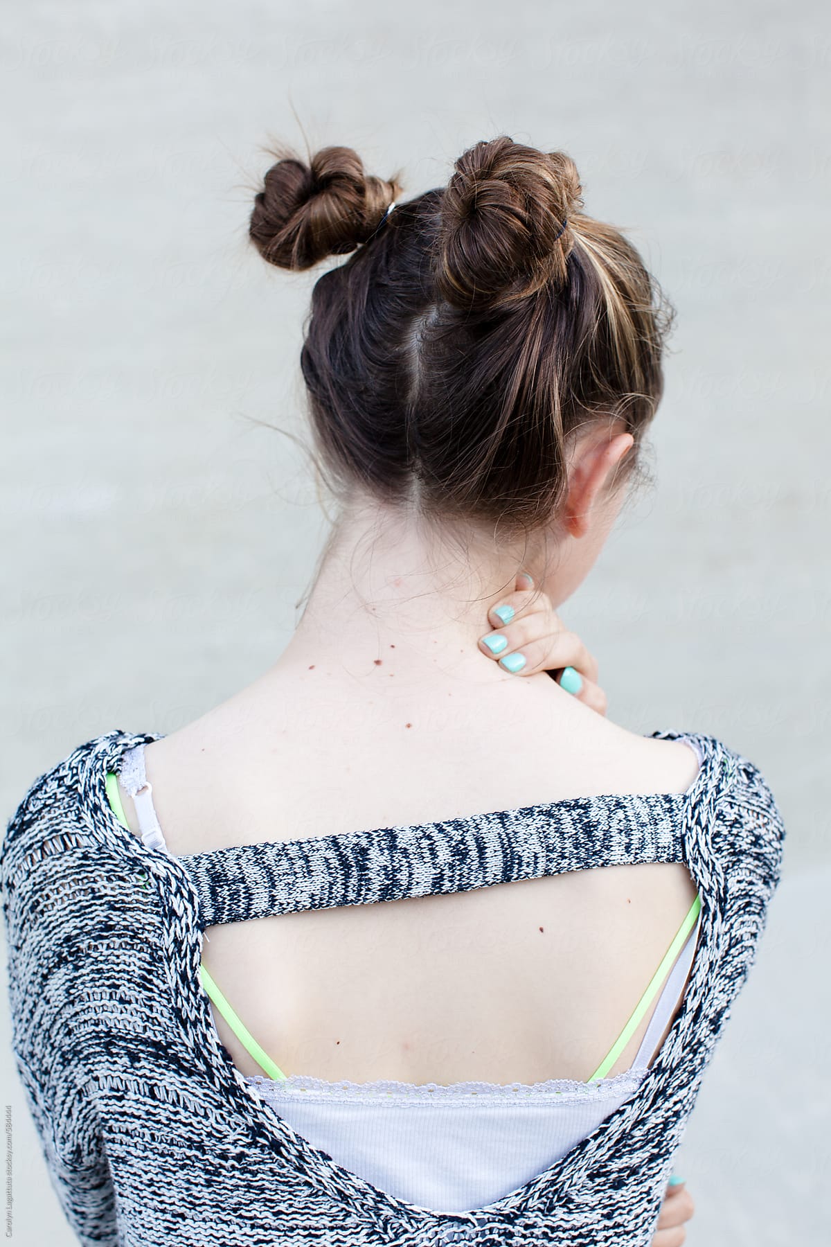 Back View Of A Teenage Girl With Buns In Her Hair By Carolyn Lagattuta