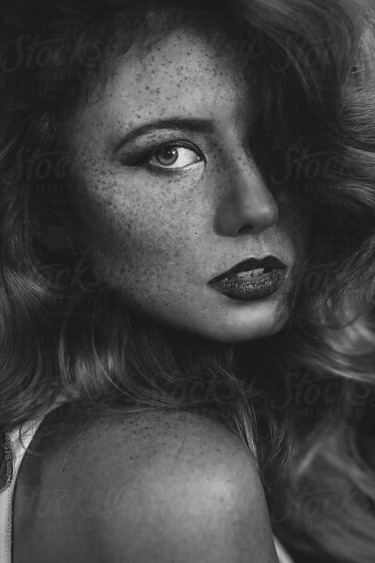 Beautiful Woman With Curly Hair And Freckles By Maja Topcagic Stocksy 