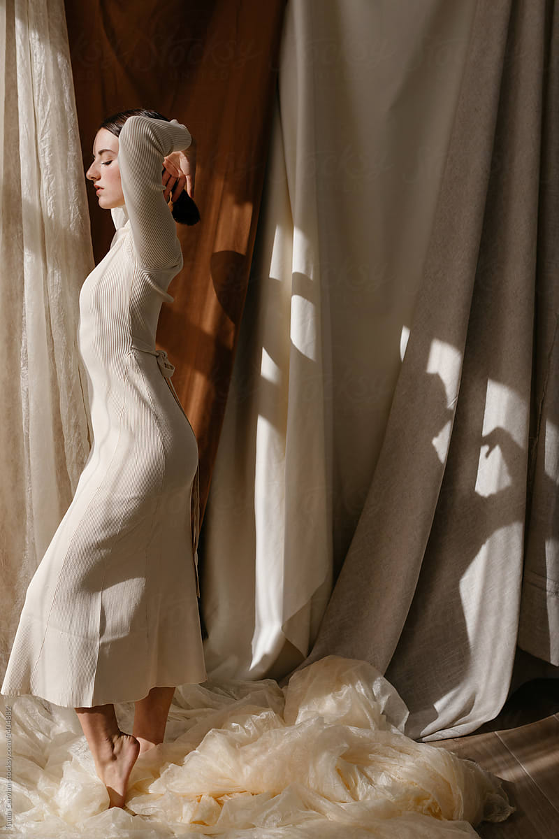 Elegant performing artist in white dress