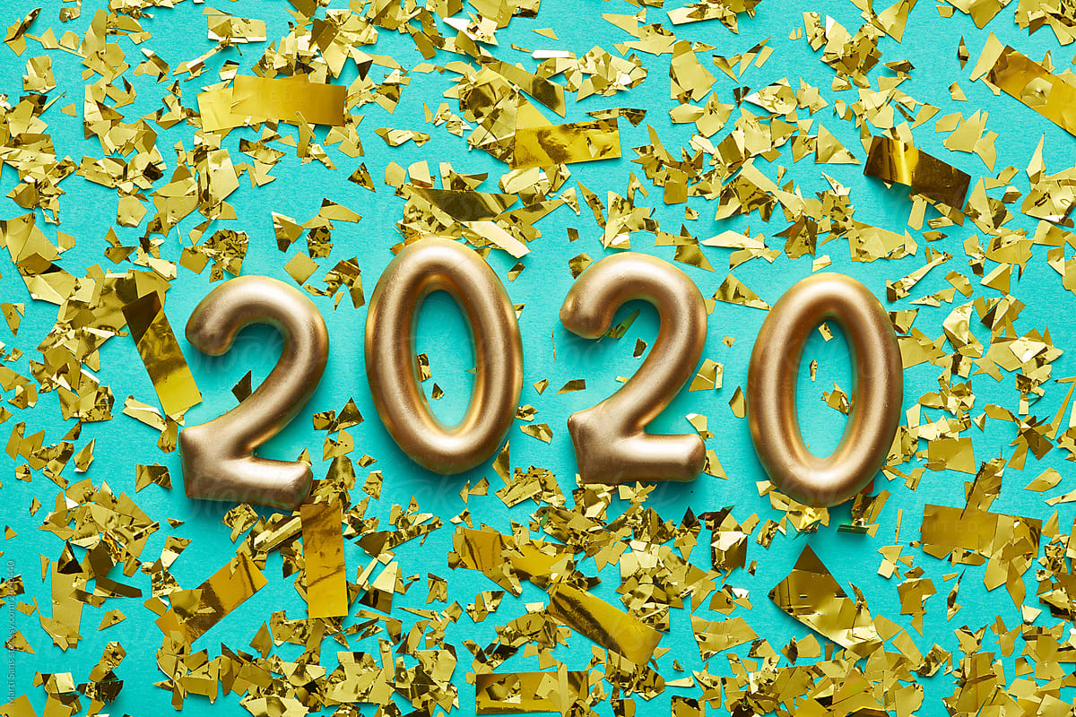 Bright 2020 numbers among confetti