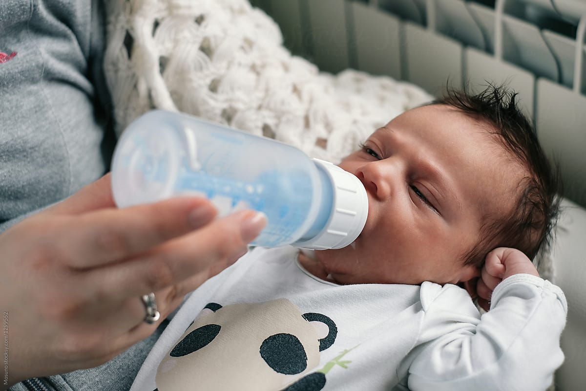 newborn baby drinking bottle