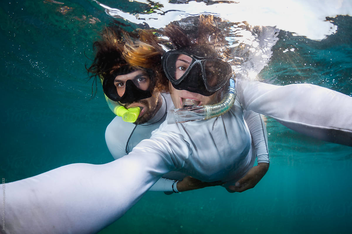 Couple having fun snorkeling