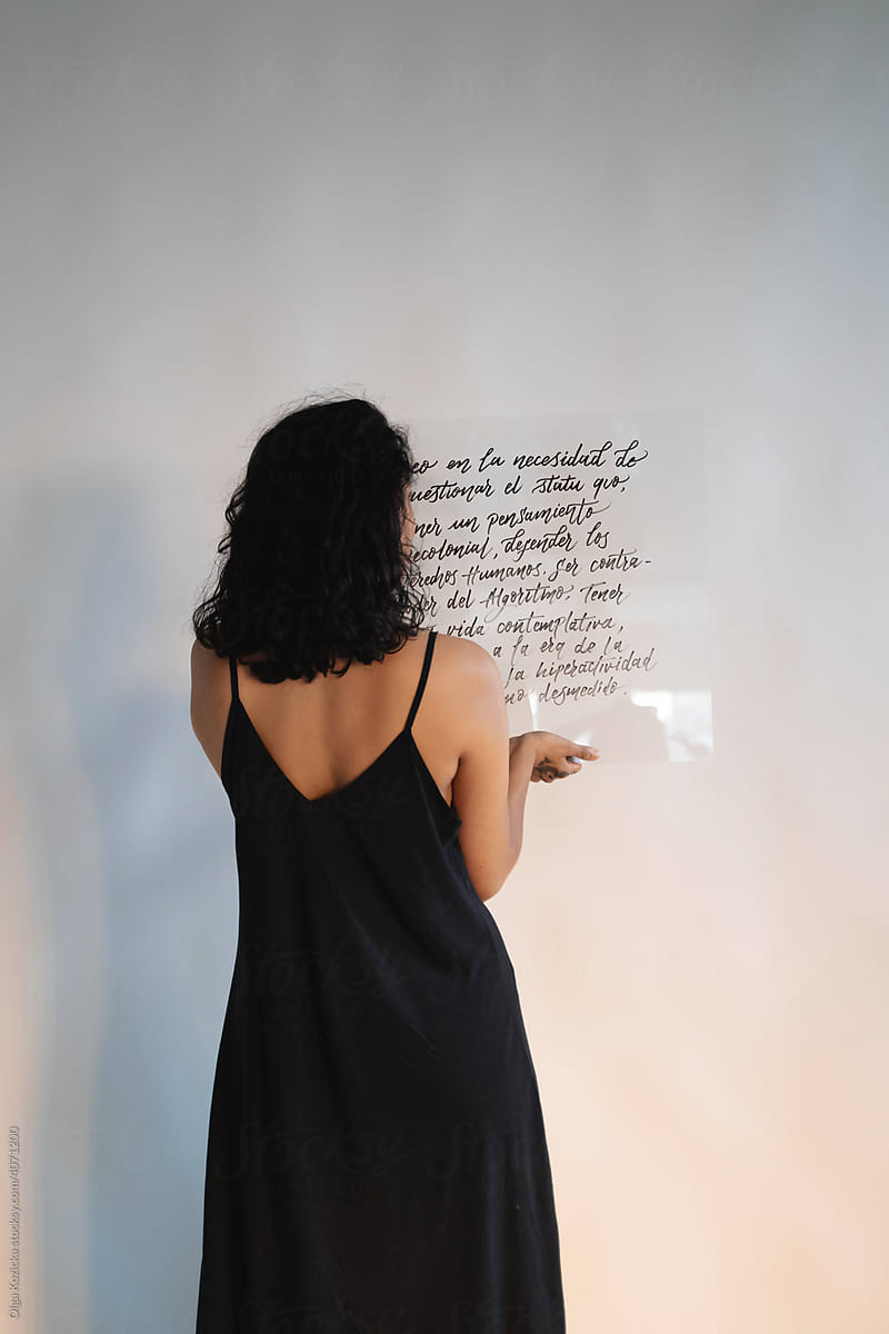 Woman Standing Back With Glass With Handwriting