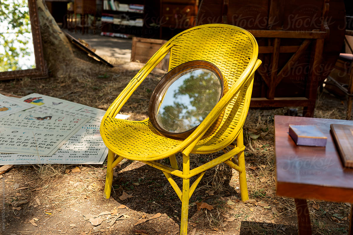 yellow chair and mirror