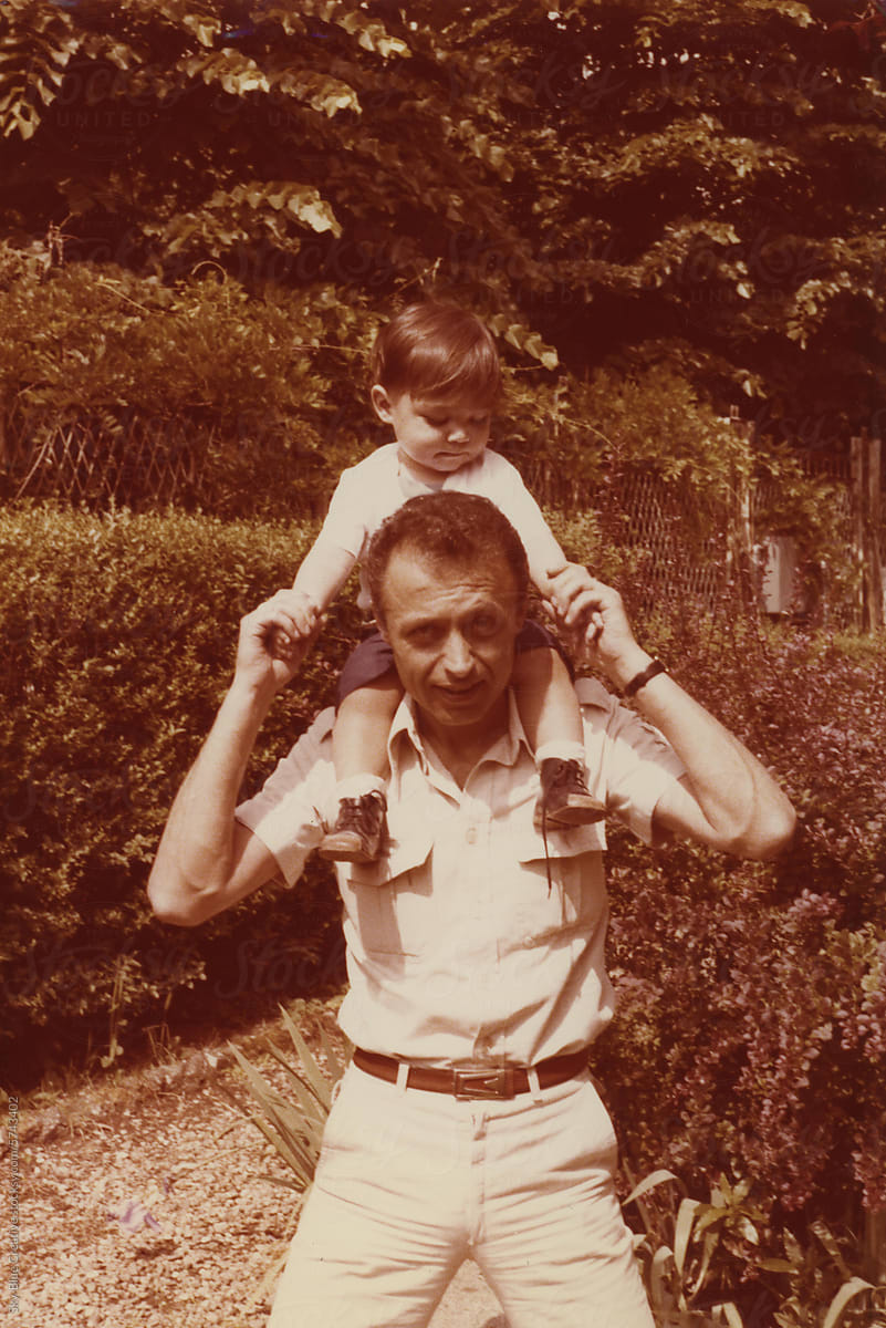 1979. Dad and son in a spring day.