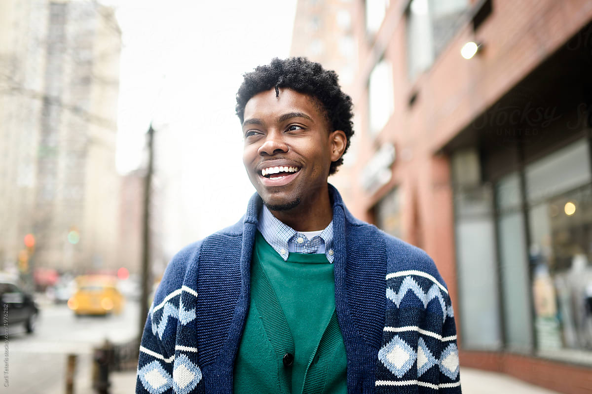 New York university student on the street in a sweater vest