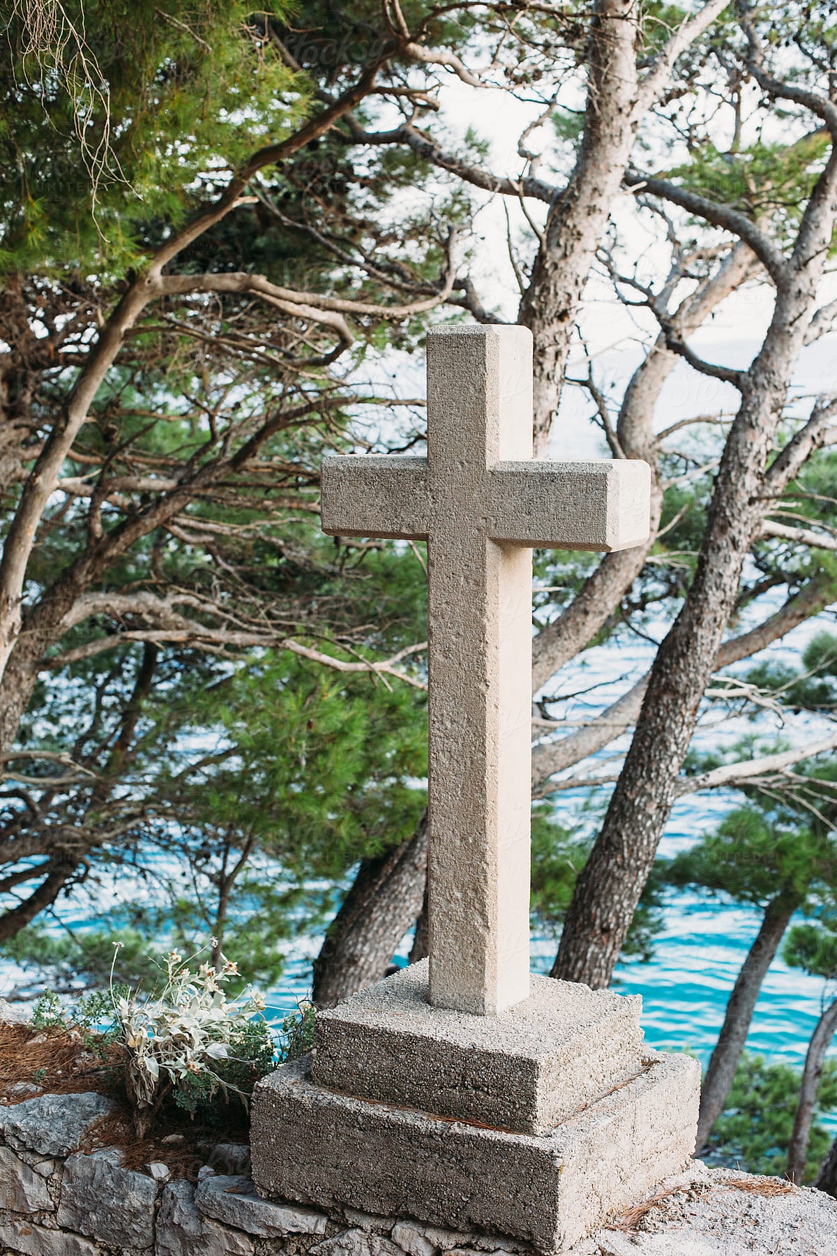 A cross,, a Catholic relagious symbol by the sea