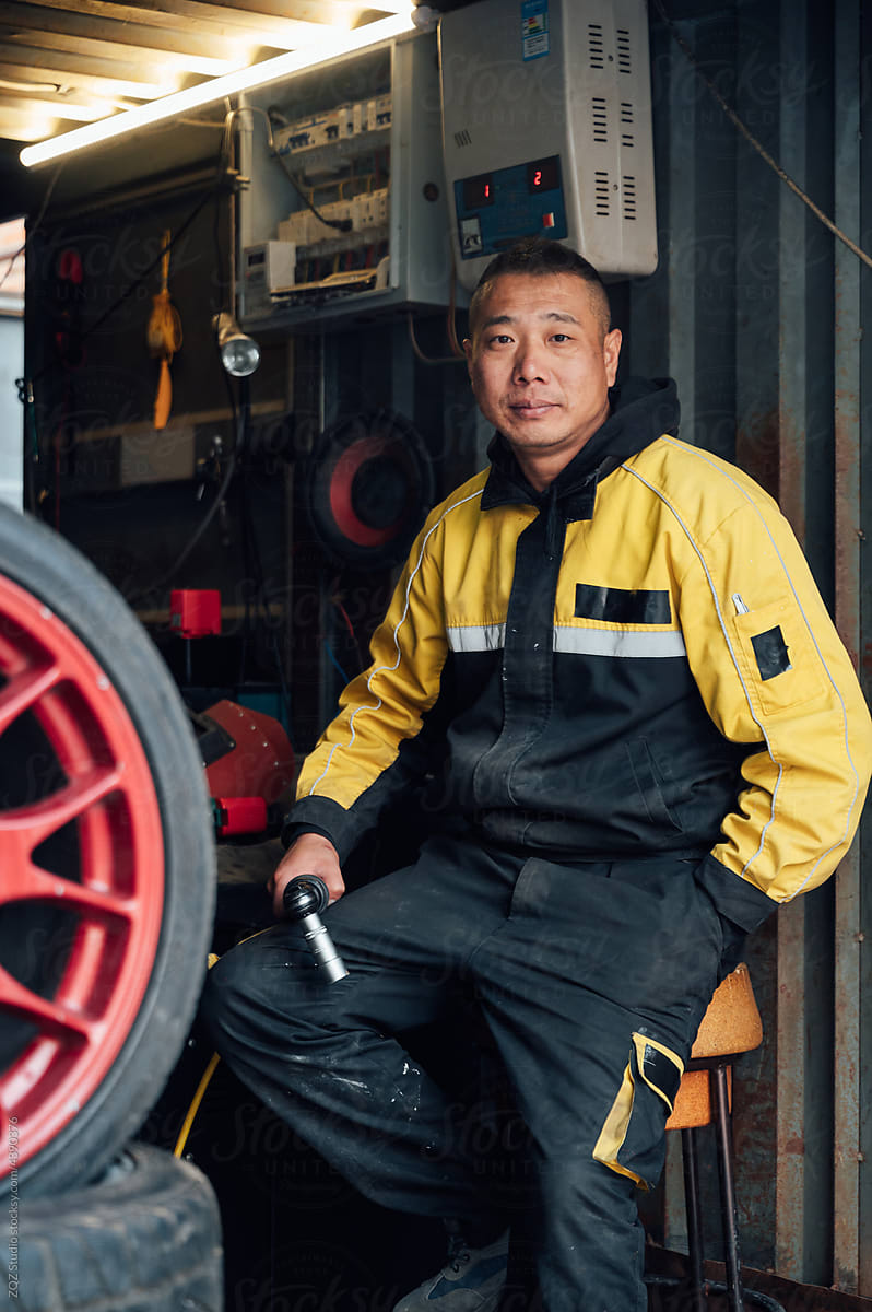 Portrait of Asian car mechanic