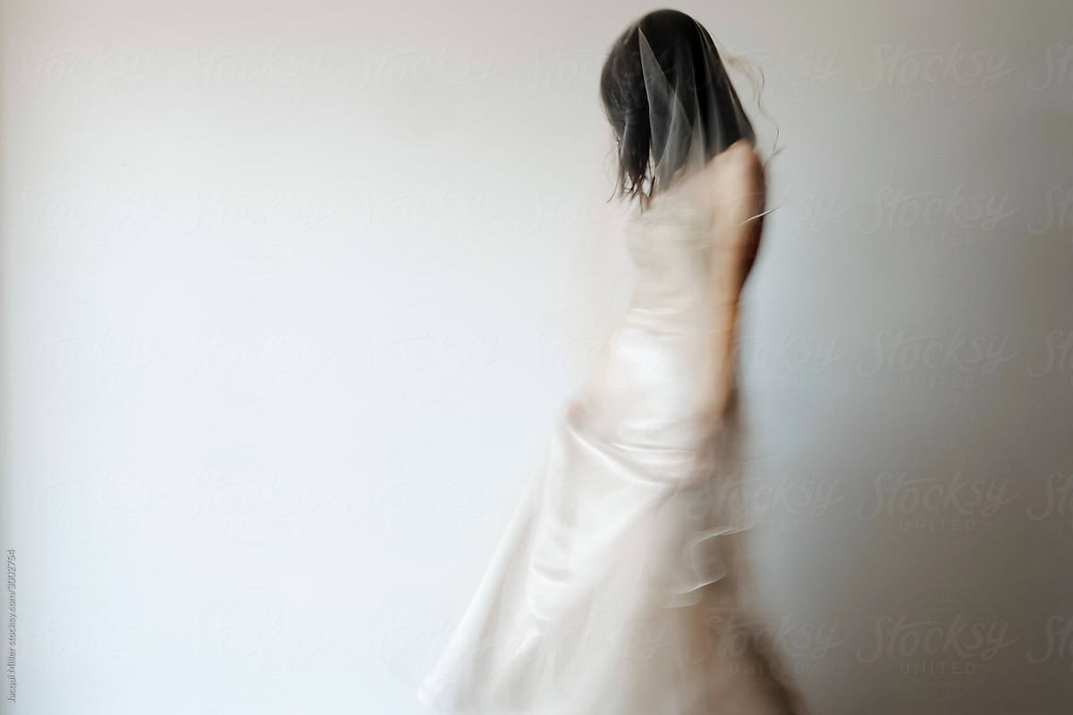 Woman Moving In An Evening Gown With Head Bent By Stocksy Contributor Jacqui Miller Stocksy 3760