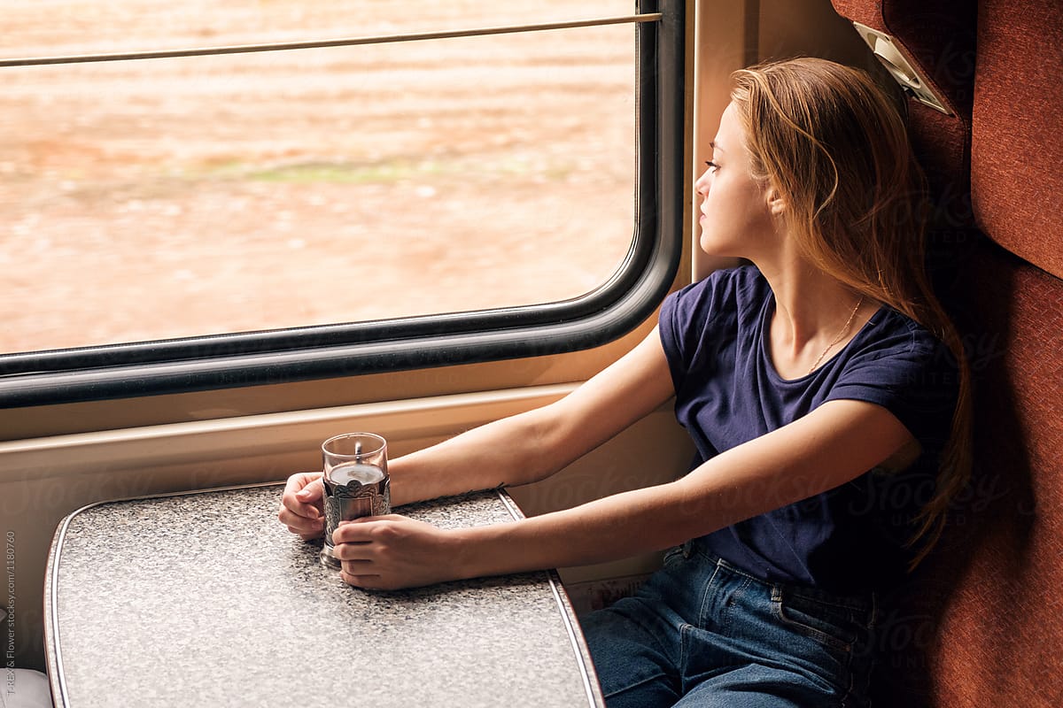 Blonde Woman With Drink In Train By Stocksy Contributor Danil Nevsky blonde-woman-with-drink-in-train-by-stocksy-contributor-danil-nevsky