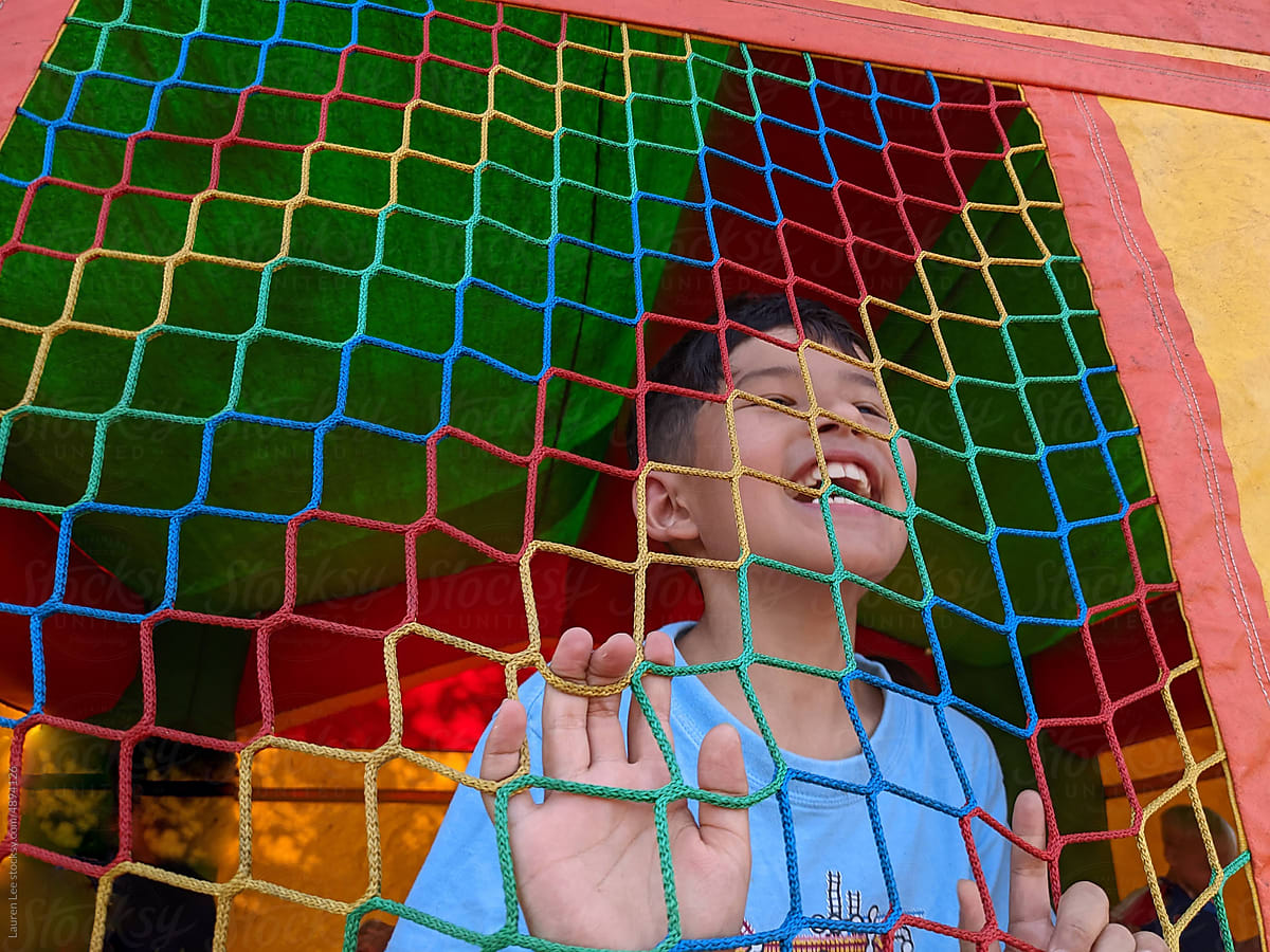 Happy kid in bounce house