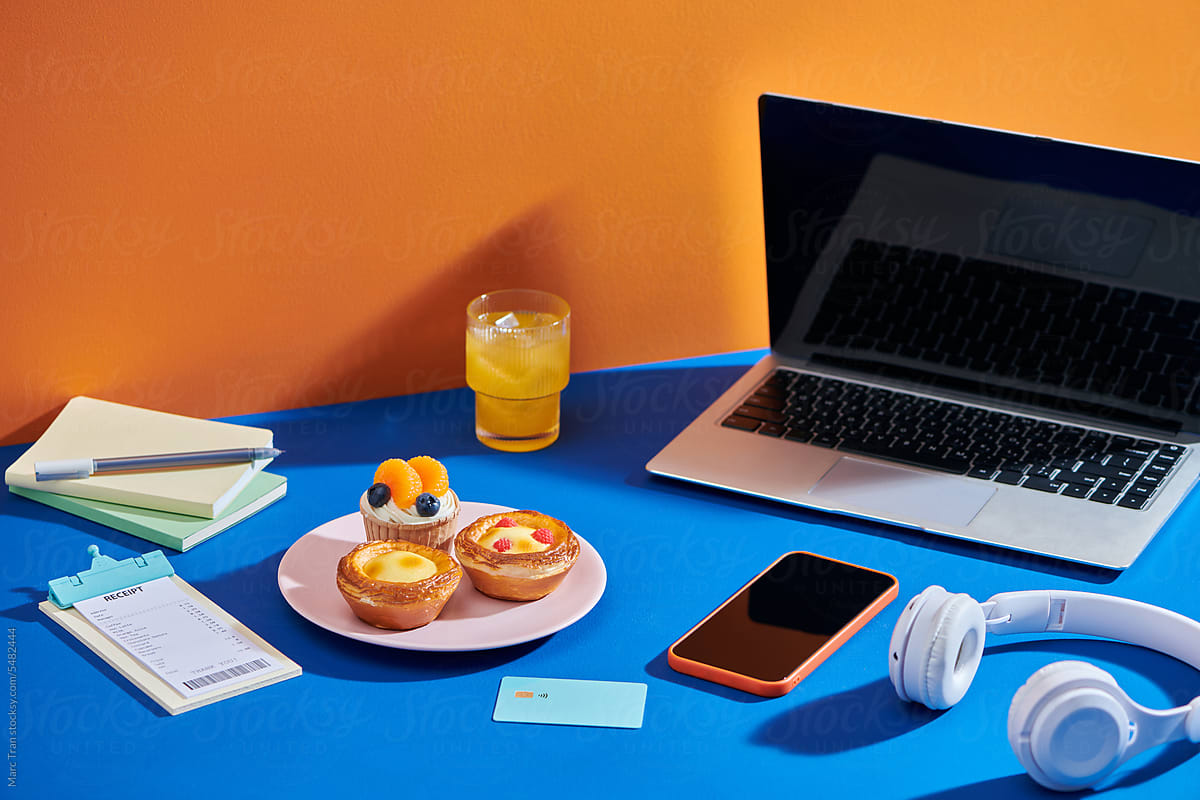 Work from home, Working desk with dessert and juice.