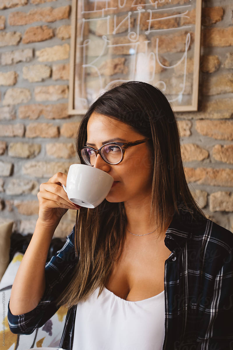 Beautiful Brunette Woman Drinking Coffee By Stocksy Contributor Katarina Radovic Stocksy 