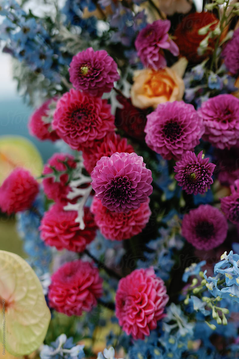 Ornamental flower composition alfresco wedding arch floristry event