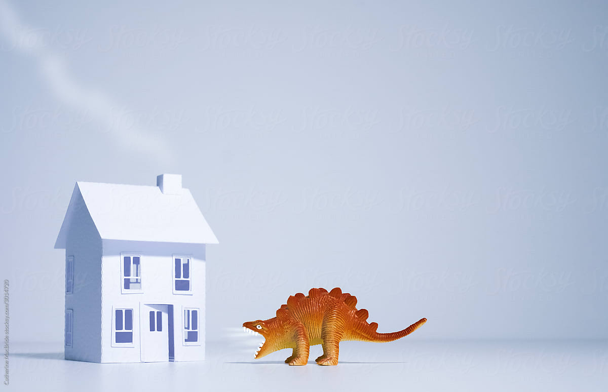 I'll Huff and I'll puff! Toy dinosaur tries to blow down paper house